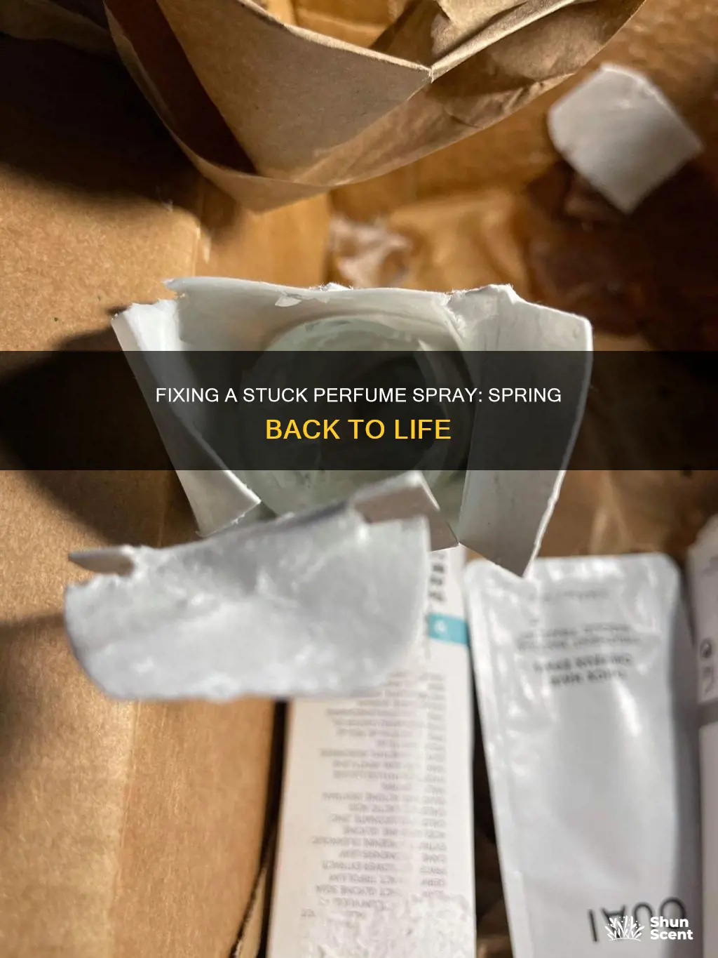 how to fix spring on a perfume spray bottle