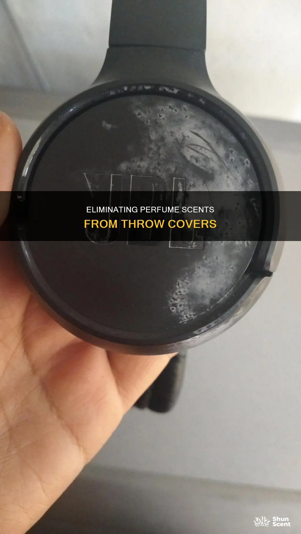 how to get perfume smell from throw cover