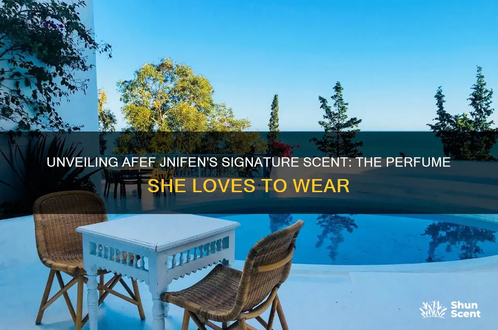 what perfume does afef jnifen wear